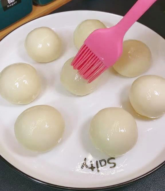 brush the dough ball with oil