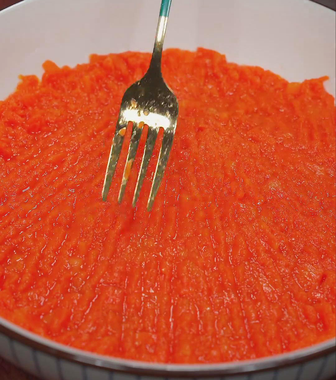 mash the steamed carrots