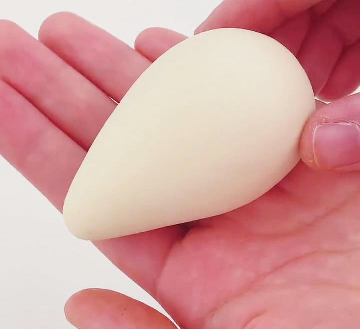 roll the dough between your palms to form a smooth, oval shaped ball