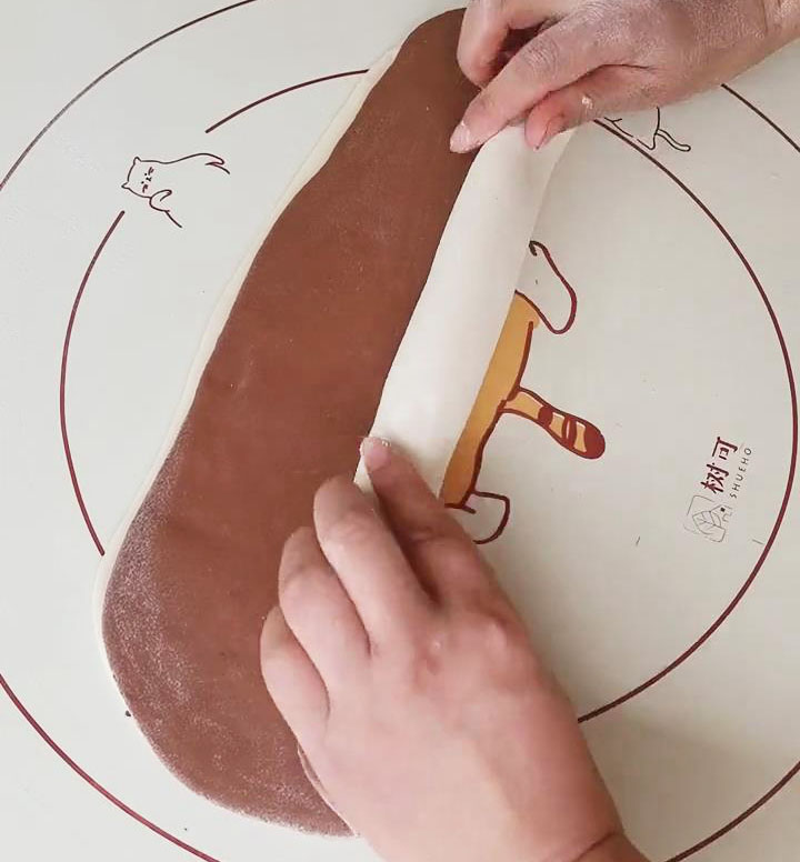 roll the stacked dough into a log
