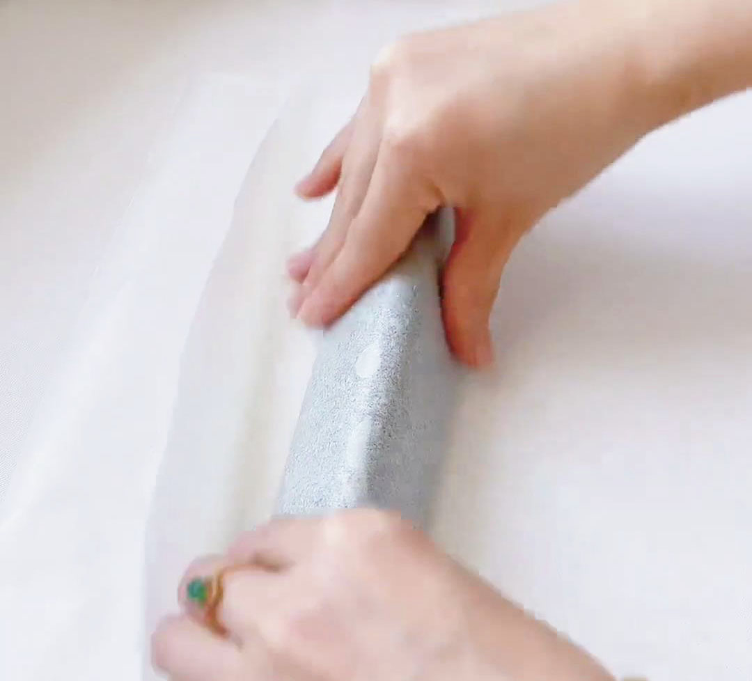 shape it into a long triangular dough with your hands