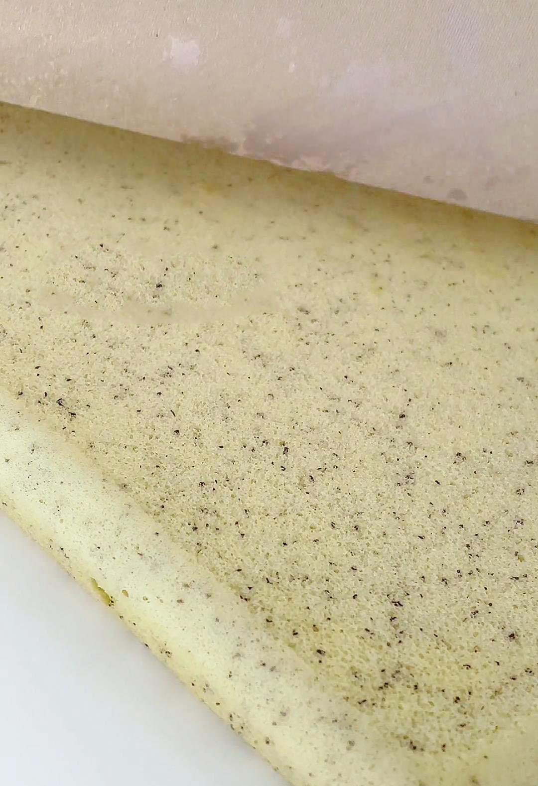 turn it over to a flat surface lined with parchment paper