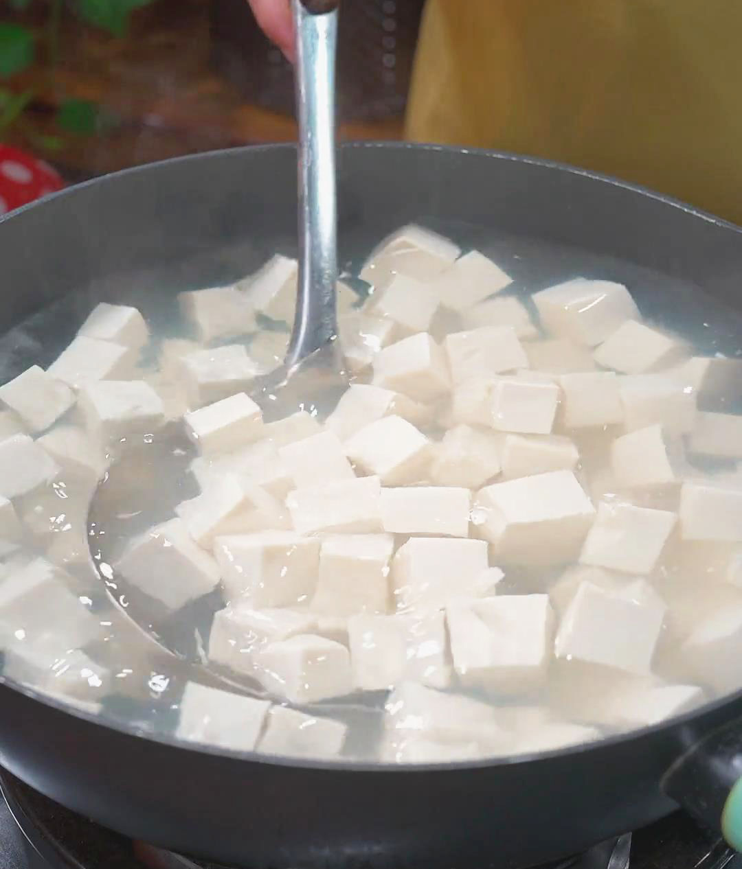 Blanch the tofu cubes