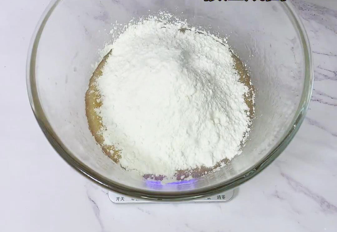Then, add milk powder and plain flour