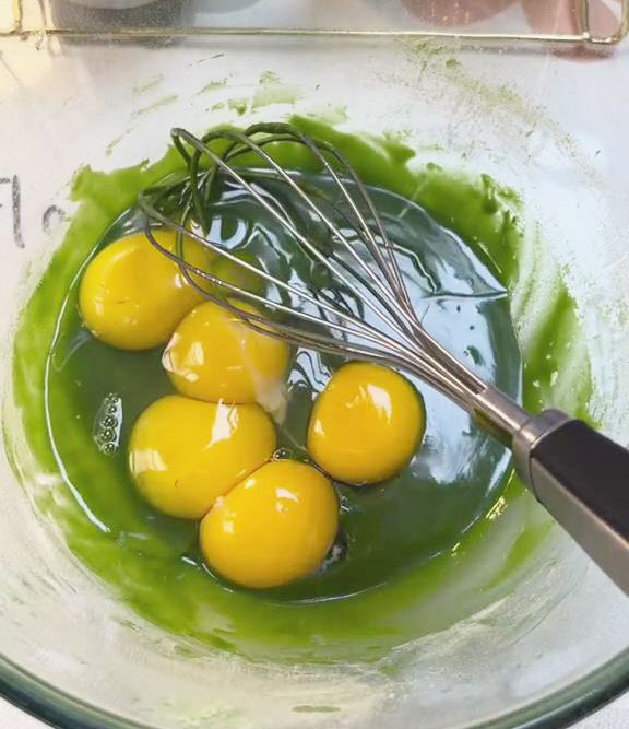 add 4 egg yolks and a whole egg