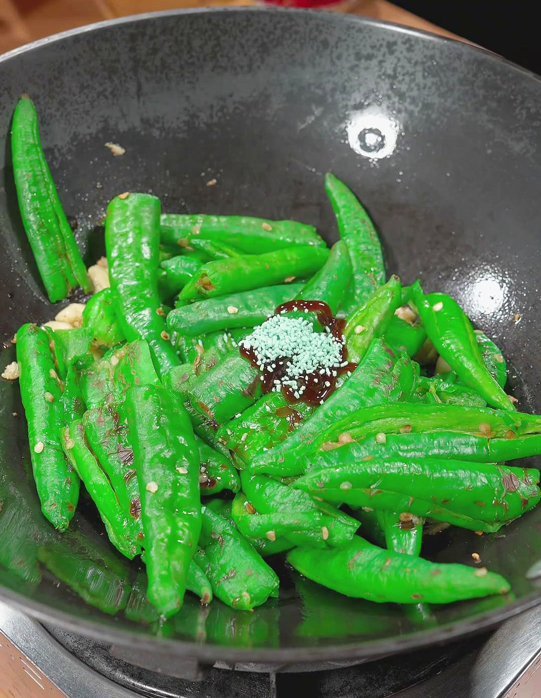 combine the charred green peppers and seasonings